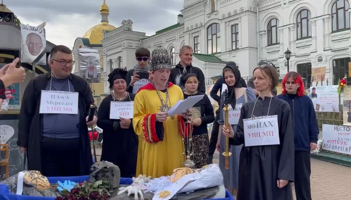 Agitating for the OCU, the magician Belial with activists held a