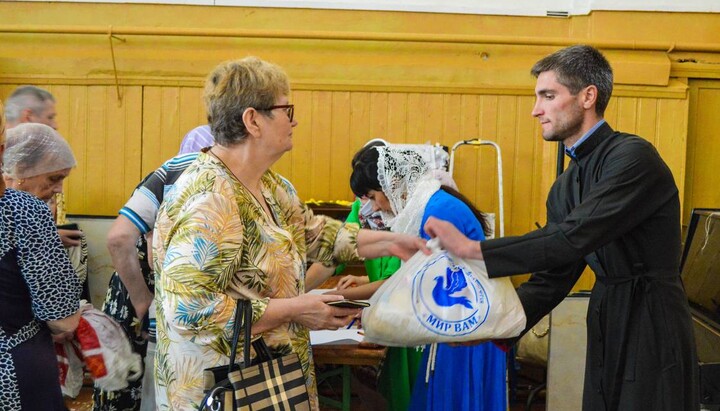 A handout of humanitarian aid at Sts Constantine and Helena’s Church in Kiev. Photo: Telegram channel