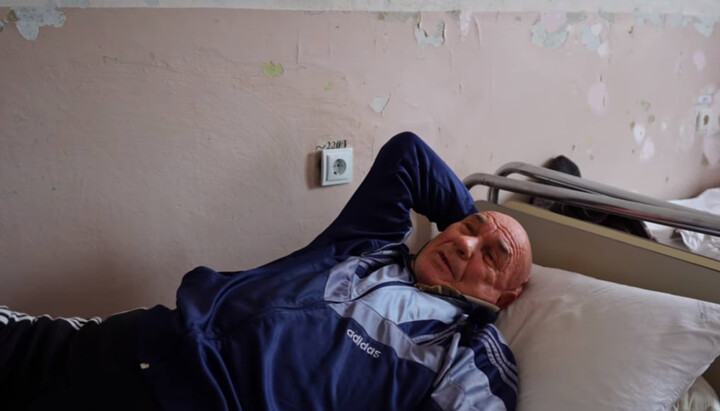 Oleh Slobodianyk, a victim of an attack by OCU raiders on a monastery in Cherkasy. Photo: a video screenshot of the YouTube channel
