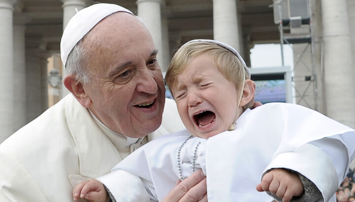 The Pope with a child dressed in a